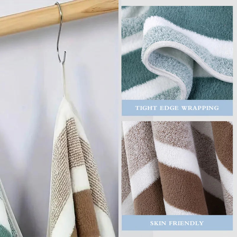 A white and brown striped bath towel hanging on a wooden rack, showing tight edge wrapping and skin friendly texture.