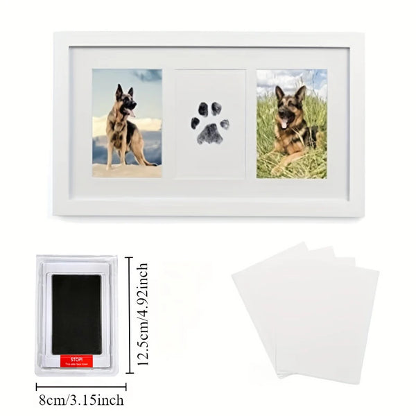White framed print featuring three dog paw prints on a white background