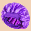 A purple satin wide brim shower cap shown from the side.