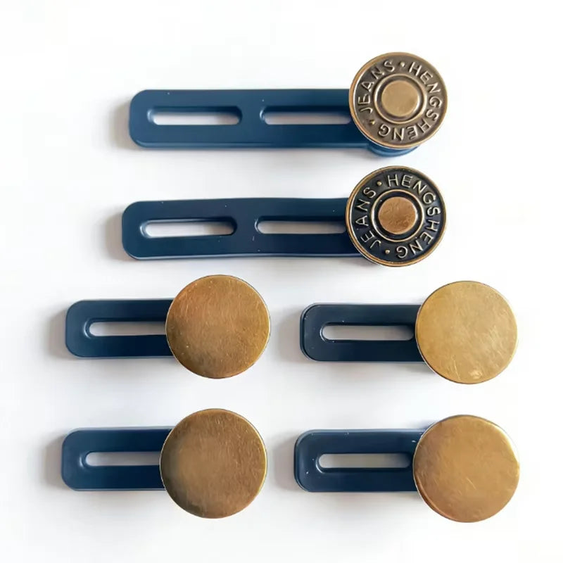 A set of adjustable button extenders featuring brass and dark blue components.