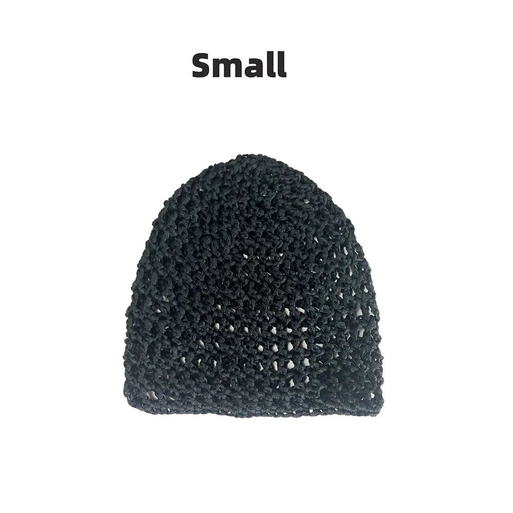 A small black hand-crocheted mesh hair net cap.