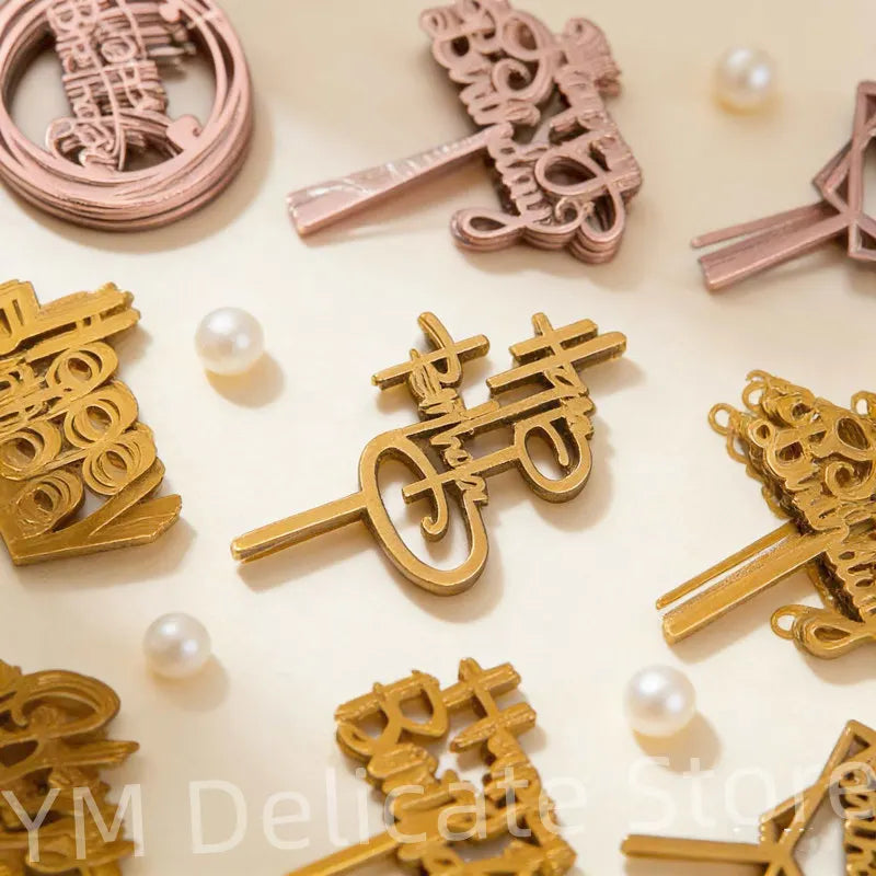 A collection of delicate rose gold acrylic birthday cake toppers featuring various ornate and elegant designs.