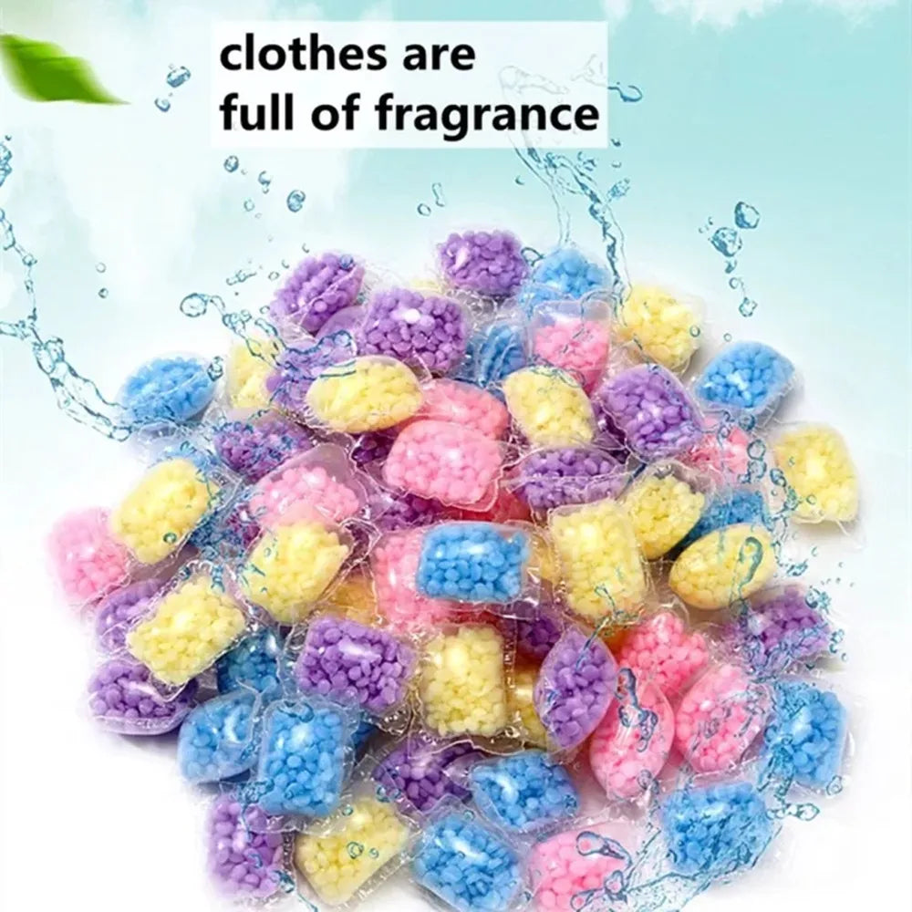 A pile of colorful laundry fragrance beads in various shades of purple, blue, yellow, and pink.