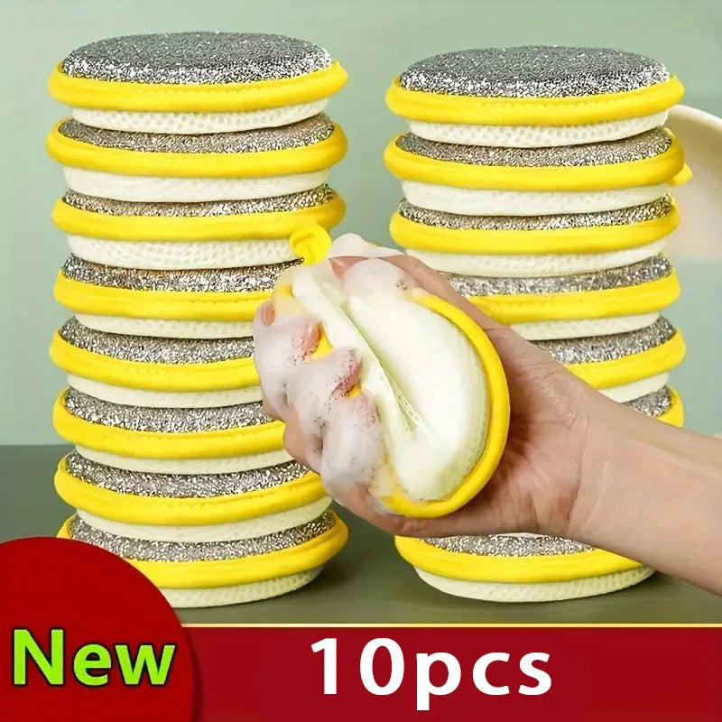 A hand holds a stack of yellow and silver reusable double-sided dishwashing sponges.