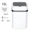 A white and black automatic touchless sensor trash can with a lid.