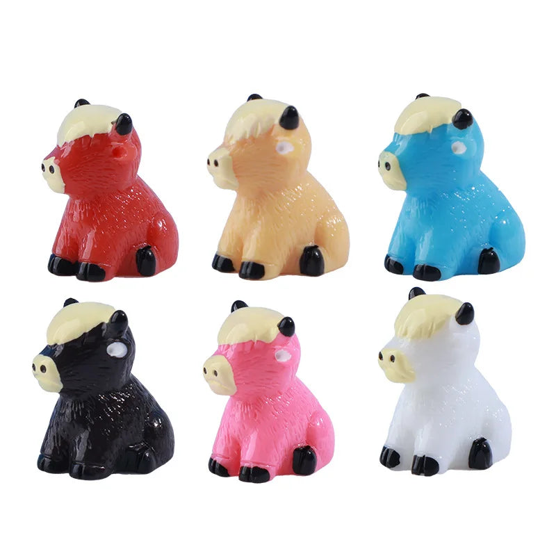A set of six resin highland cow figurine decor in various colors including red, yellow, blue, black, pink, and white.