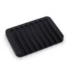 Black self-draining silicone soap dish with an anti-slip base