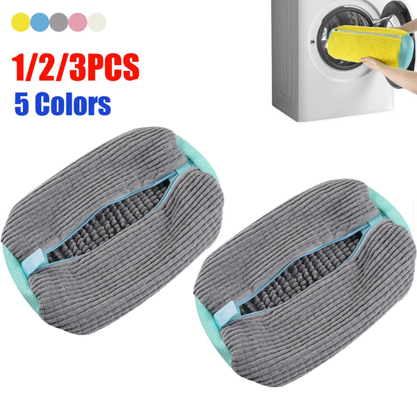 Three reusable shoe washing bags in gray and blue colors are shown next to a washing machine.