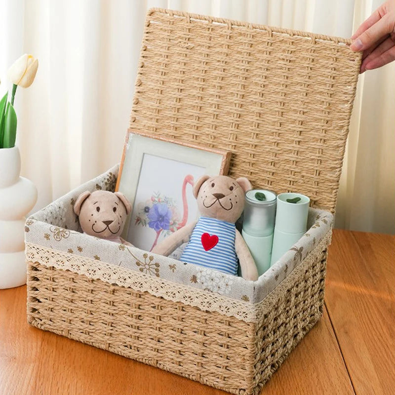 A handwoven rattan storage basket containing a framed picture and stuffed animal toys.