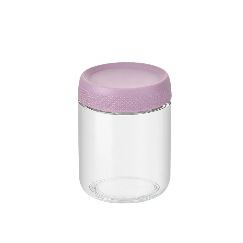 A clear glass meal prep jar with a purple airtight lid.
