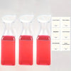 Three clear plastic dispensers filled with red liquid laundry detergent.