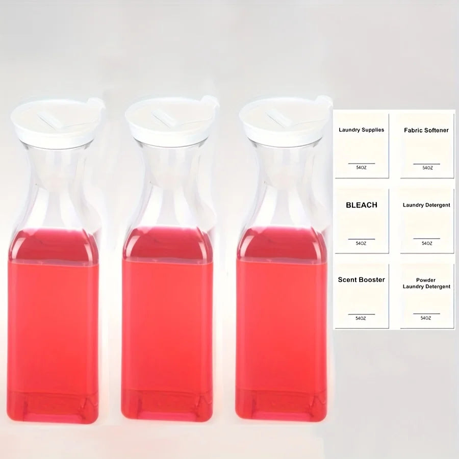 Three clear plastic dispensers filled with red liquid laundry detergent.