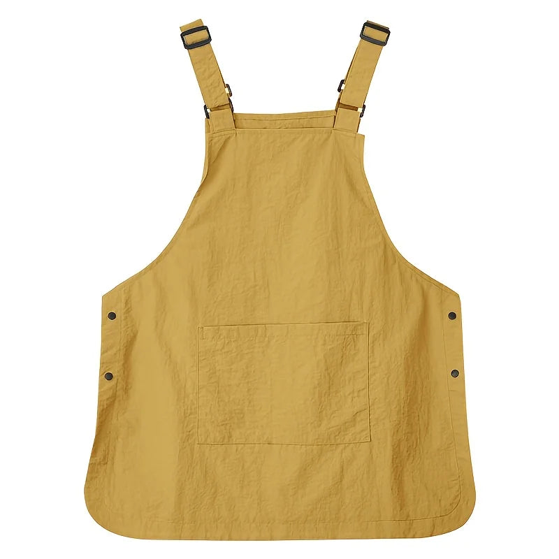 A mustard yellow waterproof outdoor work apron with straps and a large front pocket.