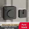 A black retractable wire clothesline with a handle and mounting bracket shown against a wall.