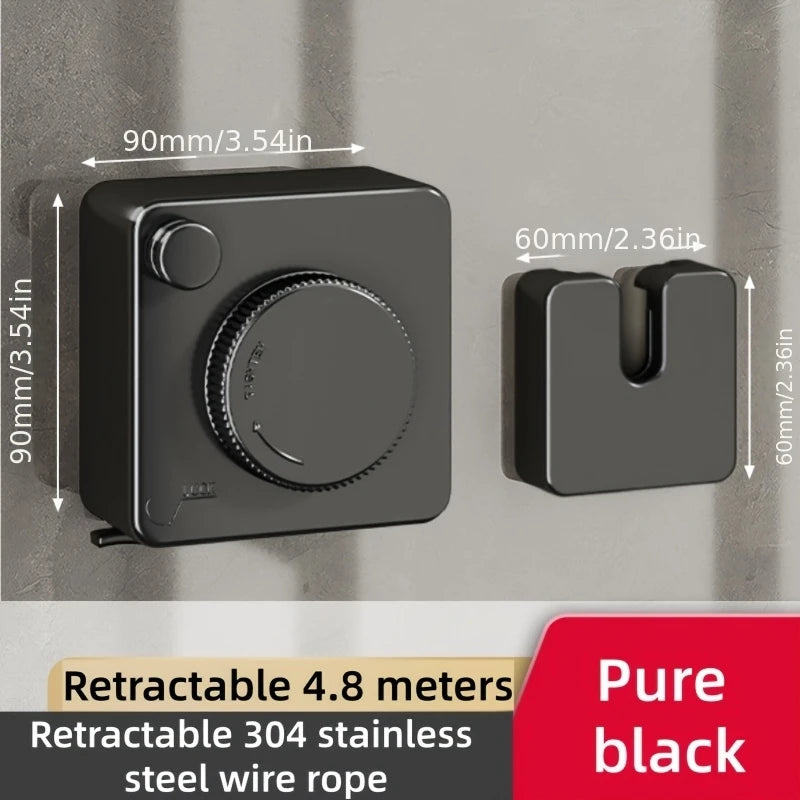 A black retractable wire clothesline with a handle and mounting bracket shown against a wall.