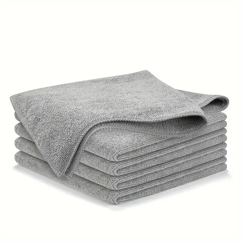 A stack of ten gray reusable microfiber cleaning cloths.