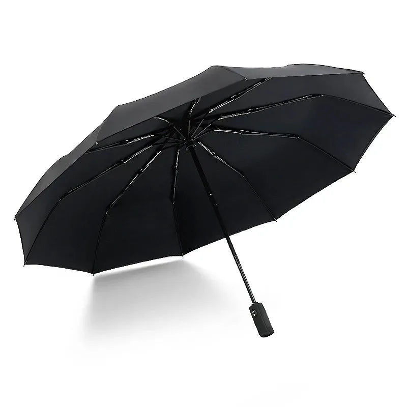 A black fully automatic double-layer outdoor umbrella viewed from above.