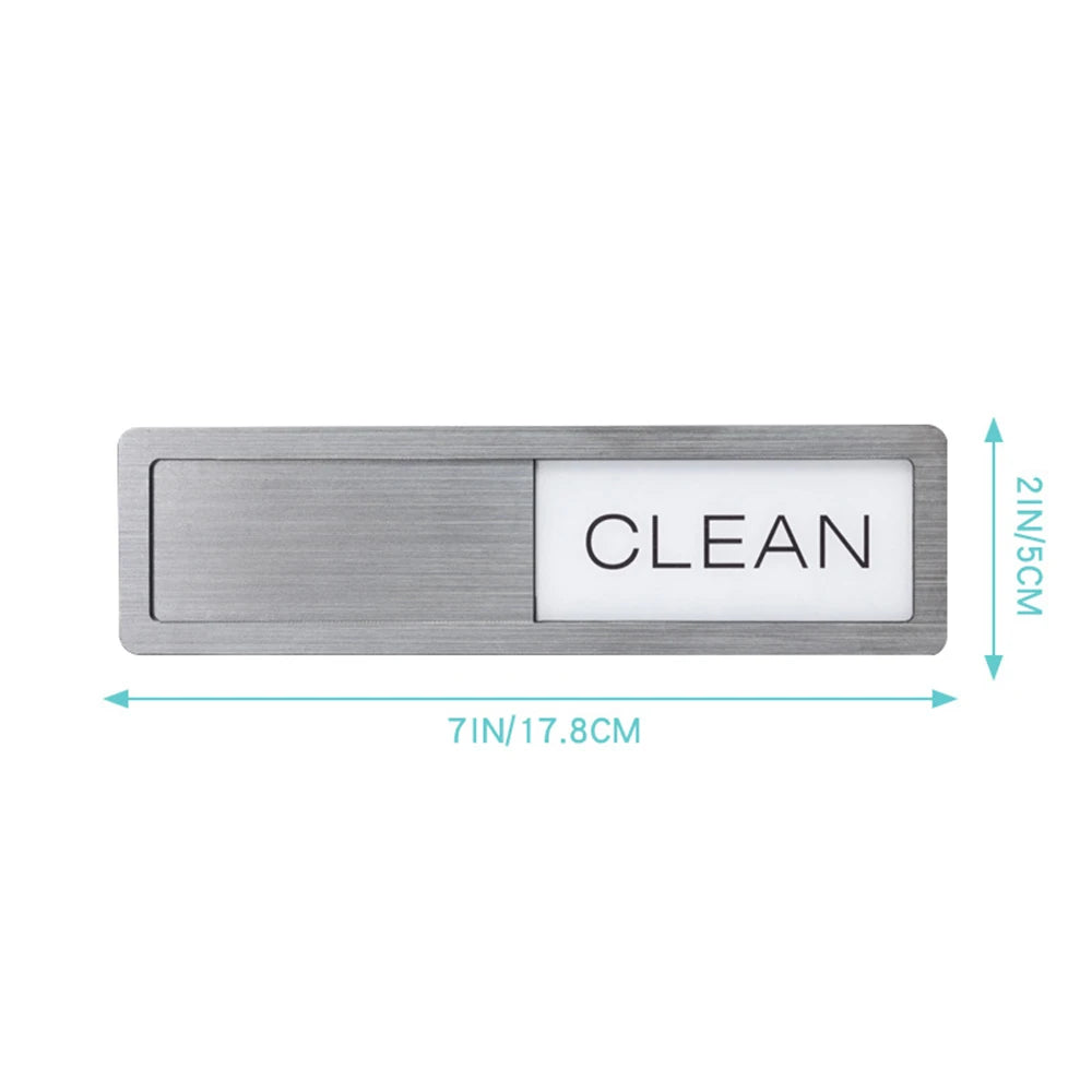 A rectangular stainless steel magnet with the word CLEAN engraved on a white surface.