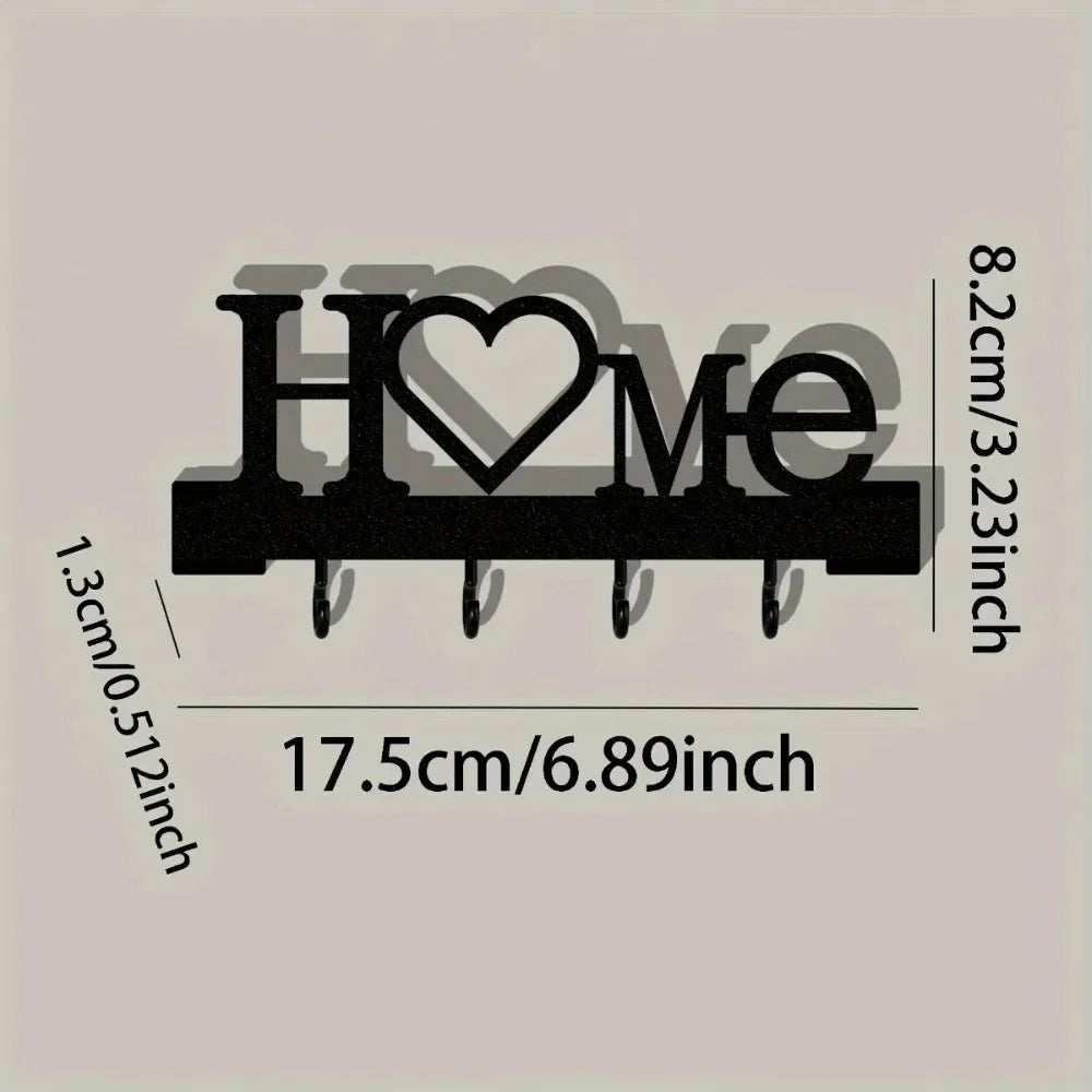 Black rustic iron key holder wall art with a heart design, measuring 17.5cm long and 8.2cm high.