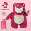 A plush toy resembling a red panda or bear is shown next to a pink hot water bottle and strawberry-themed items.