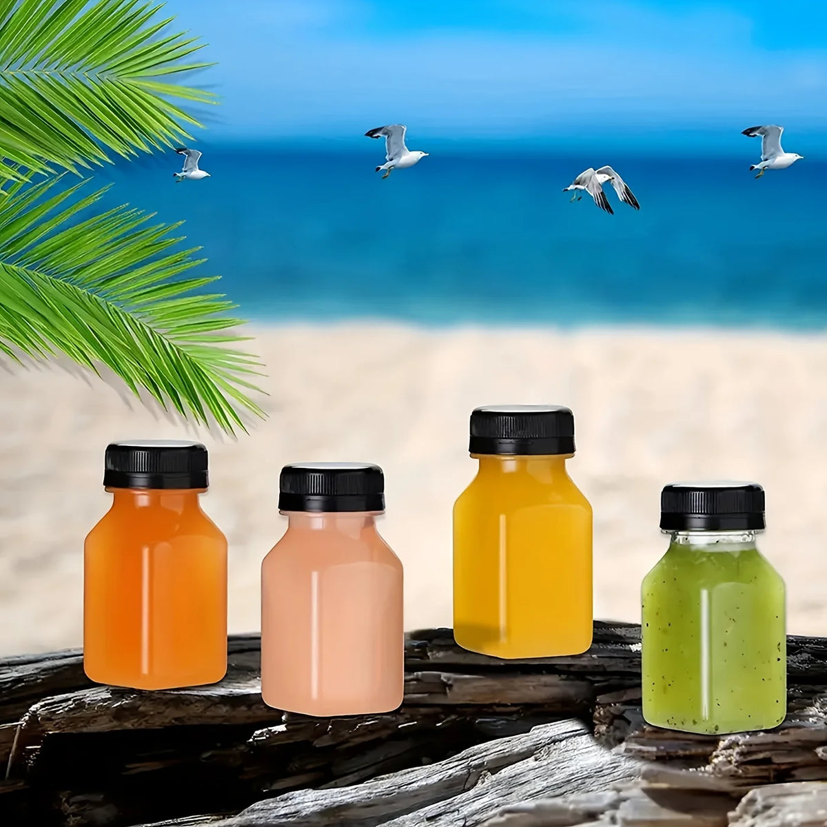 A set of leak-proof clear juice bottles filled with orange, pink, yellow, and green juices on a wooden surface near a beach b