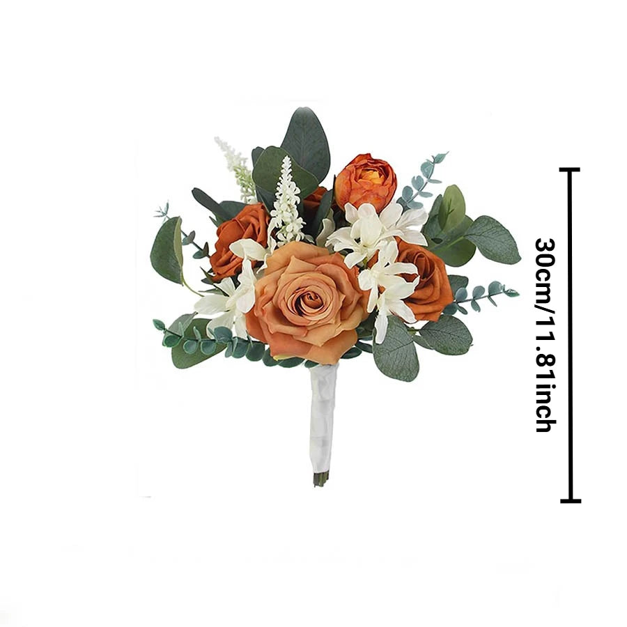 An elegant artificial rose wedding bouquet featuring orange roses, white flowers, and green foliage.