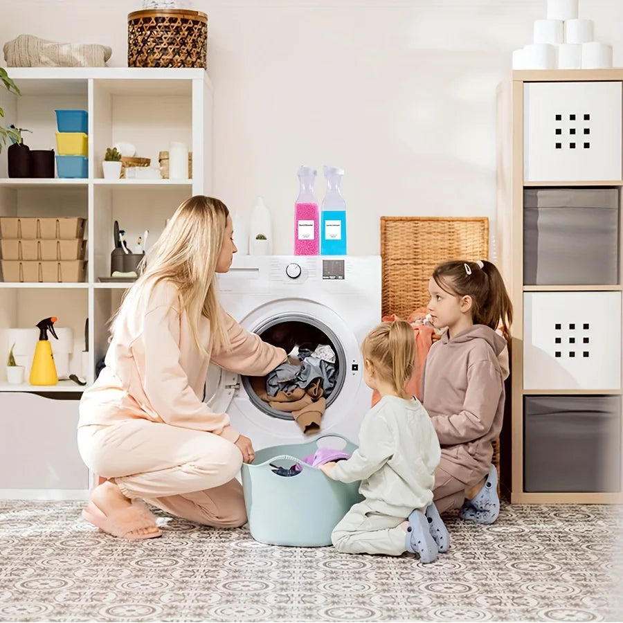 A mother and two children are gathered around a washing machine, interacting with liquid laundry detergent dispensers.