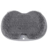 A gray wall mounted shower foot scrubber with numerous textured bristles for circulation.