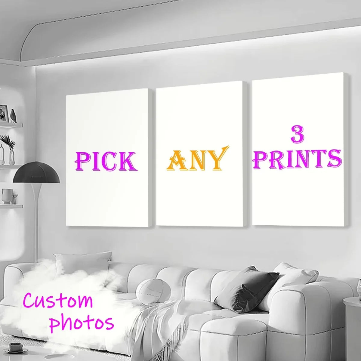 Tres impresiones enmarcadas con el texto 'PICK ANY 3 PRINTS' exhibidas en una pared blanca sobre un sofá.