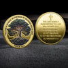 A set of gold coins featuring scripture verses like The Lord is my rock and the Tree of Life imagery.