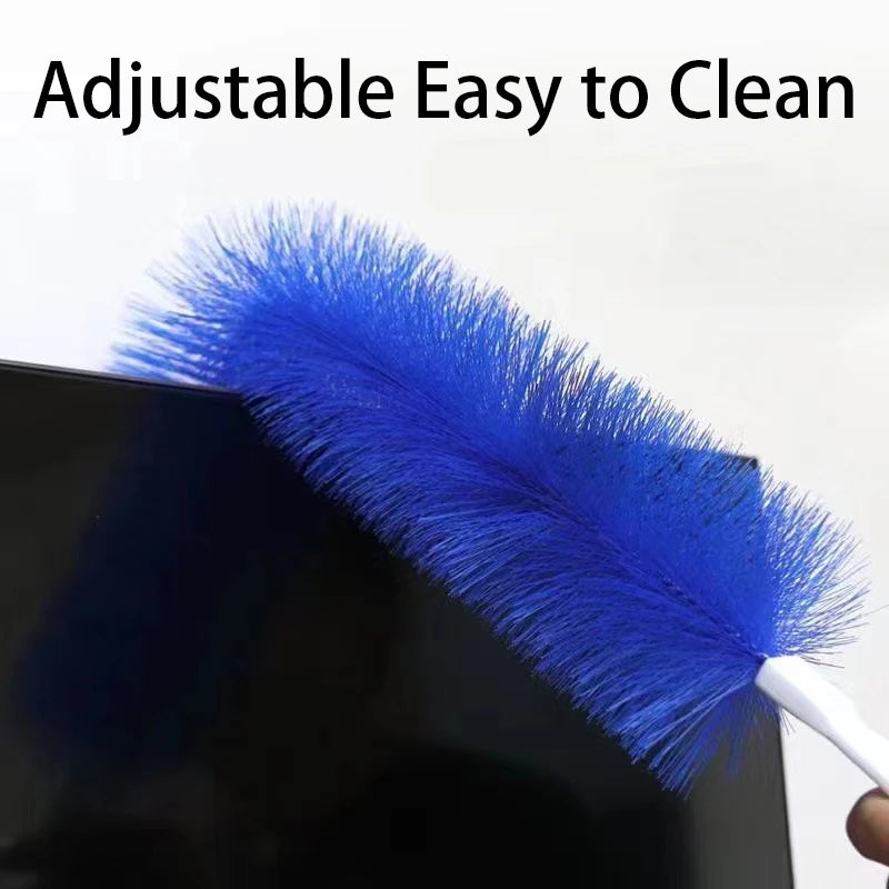 A close-up of a blue adjustable cleaning brush being used on a dark surface.