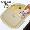 A hand is removing a lace umbrella from its compact case, demonstrating the grab and go feature.
