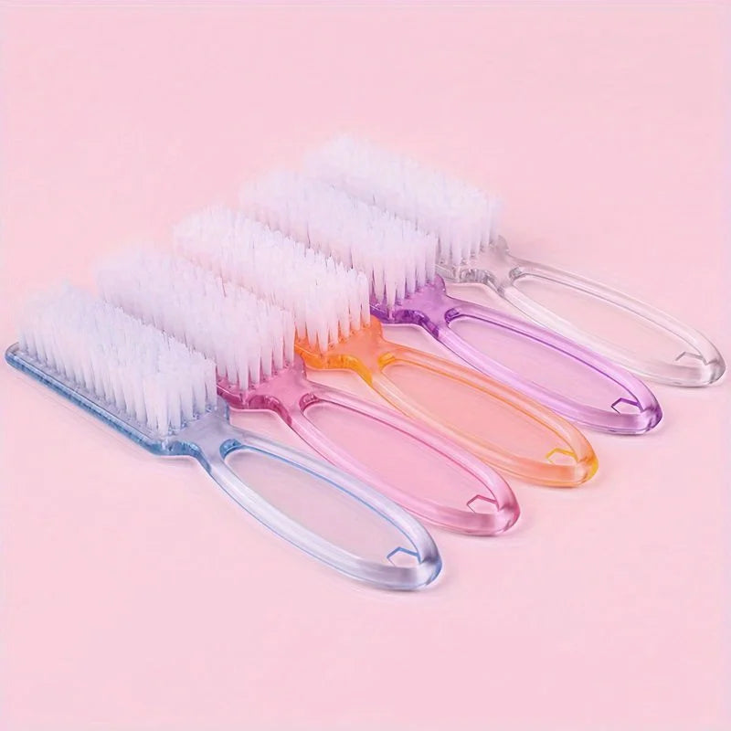 A set of multi-purpose nail art and dust cleaning brushes in various pastel colors on a pink background.
