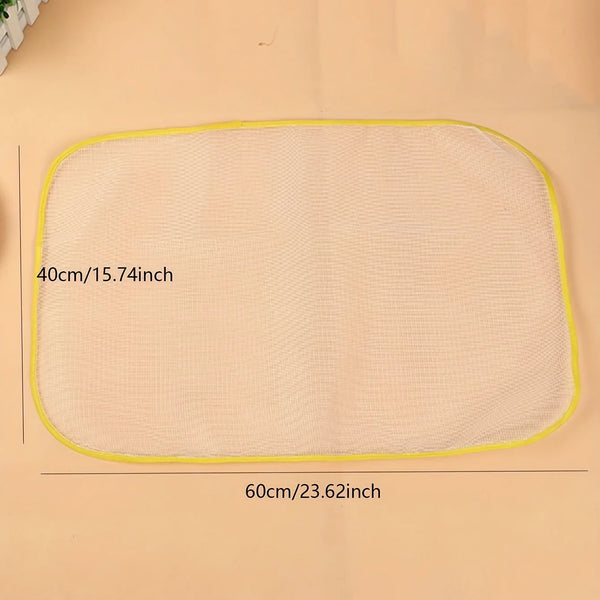 A rectangular beige heat resistant ironing cloth with yellow trim, measuring 40cm by 60cm.