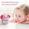 A young girl smiles while holding a pink crocheted axolotl figurine.
