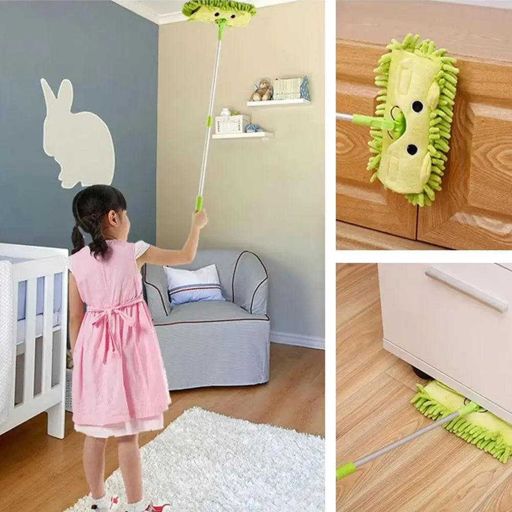 A young girl is using a yellow mini broom and dustpan set in a living room setting.