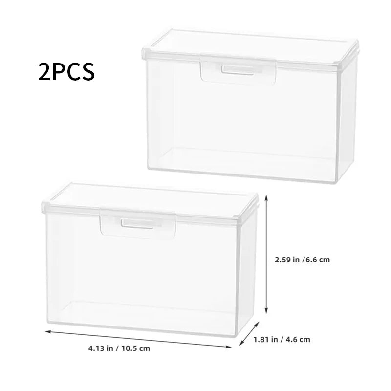 Two clear plastic storage boxes for cards and sundry items, showing dimensions.