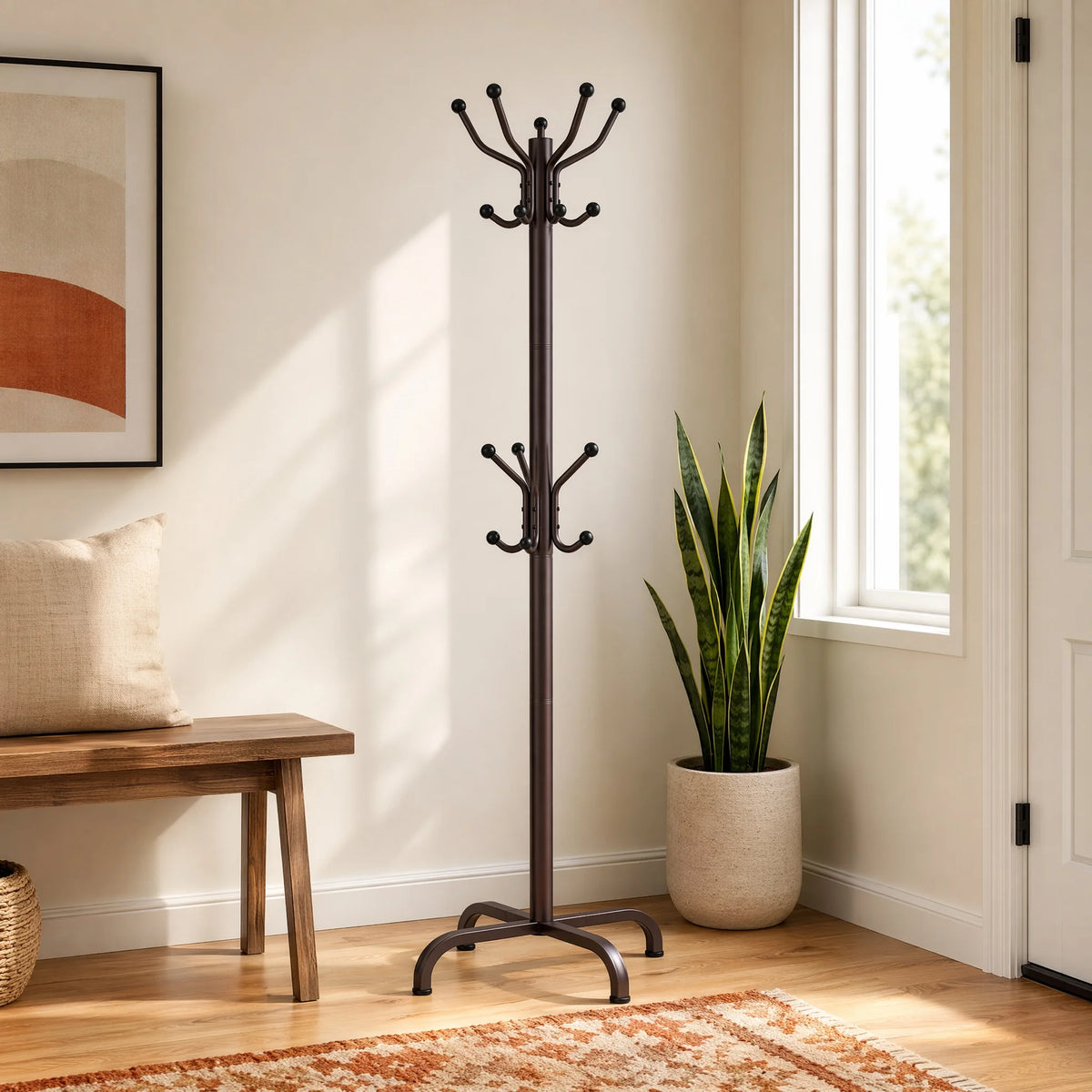 A tall, black metal coat rack with fourteen hooks stands next to a window and a wooden bench.