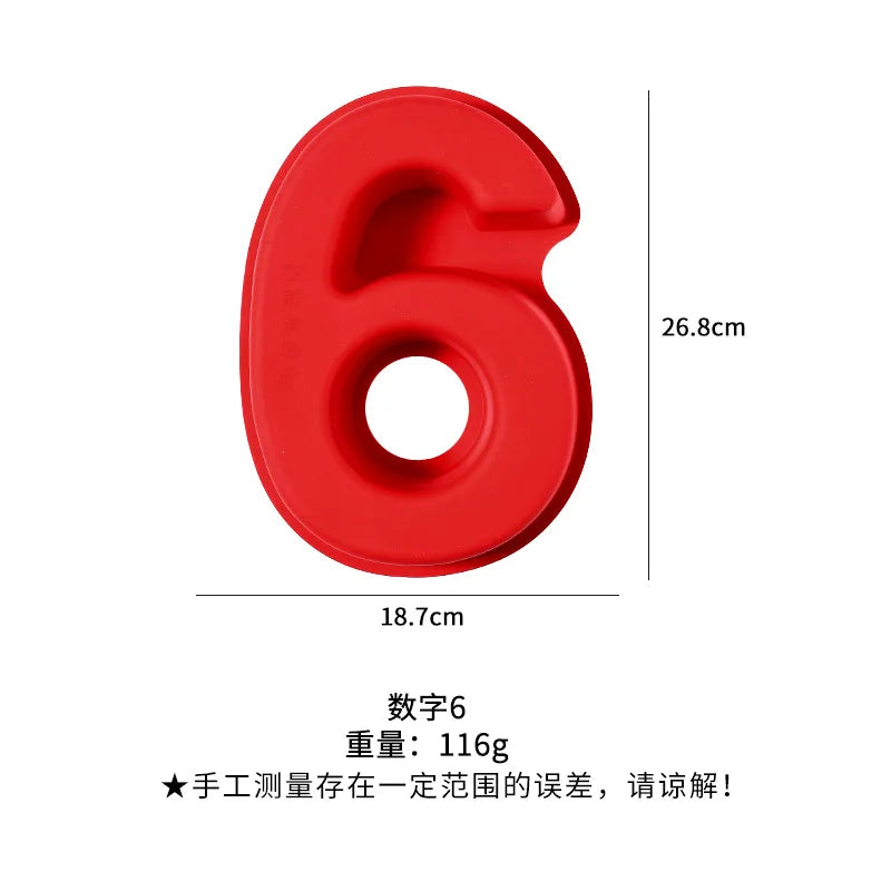 A red silicone number cake mold shaped like the numeral 6.