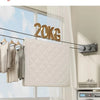 A white quilted drying rack is shown hanging from a wire, with a 20KG weight label visible in the background.