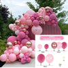 A pink and purple round foil balloon garland kit featuring various sizes of balloons and accessories.