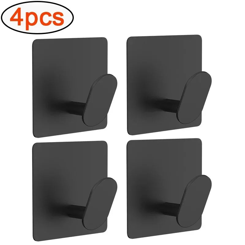 Four black stainless steel adhesive hooks for bathroom and kitchen use