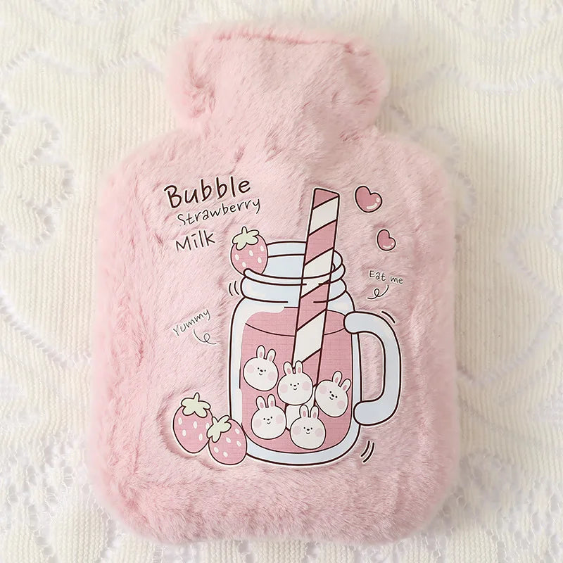 Pink plush cartoon hot water bottle featuring a strawberry milk drink illustration