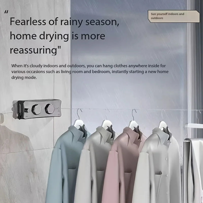 Stainless steel drying rope mounted on a wall, with various colored garments hanging from it.