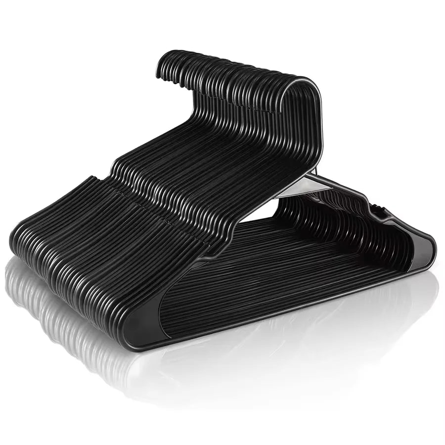 A set of thirty black plastic clothes hangers arranged in a stack.