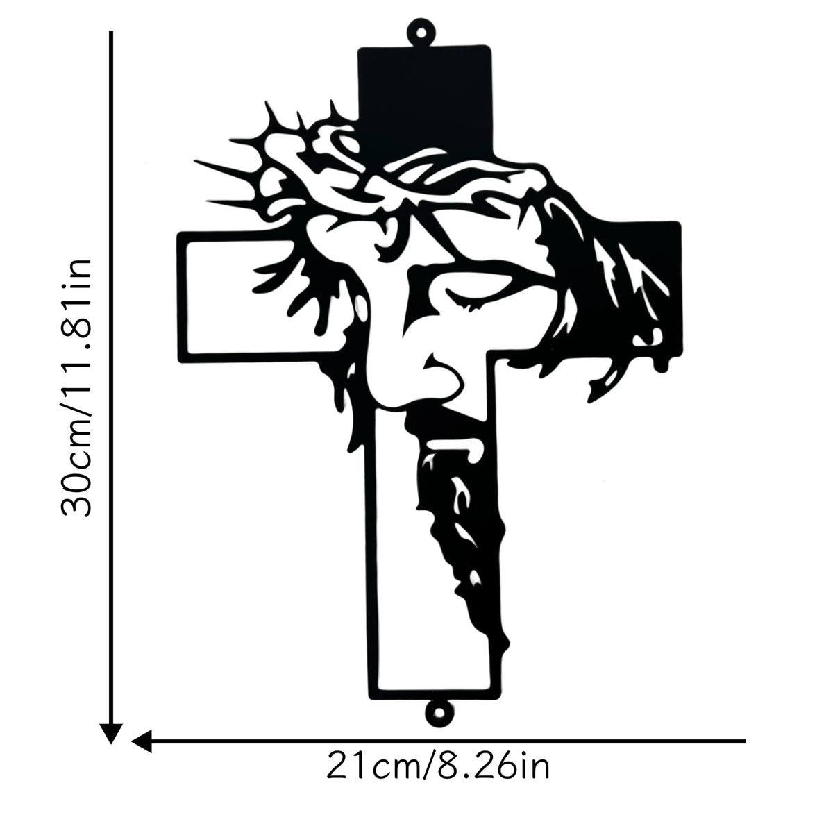 Black metal cross wall art featuring a sculpted face design