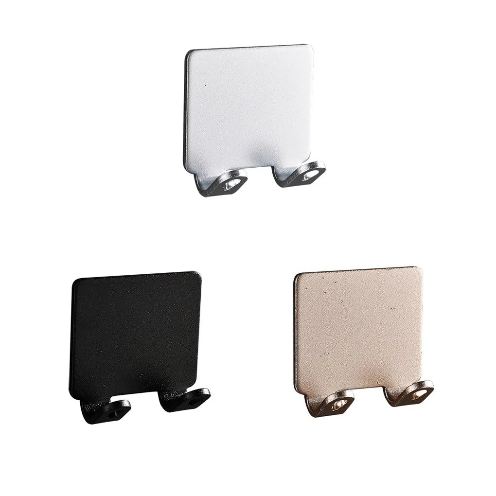 A silver aluminum shaving razor storage rack with a rectangular holder and mounting brackets.