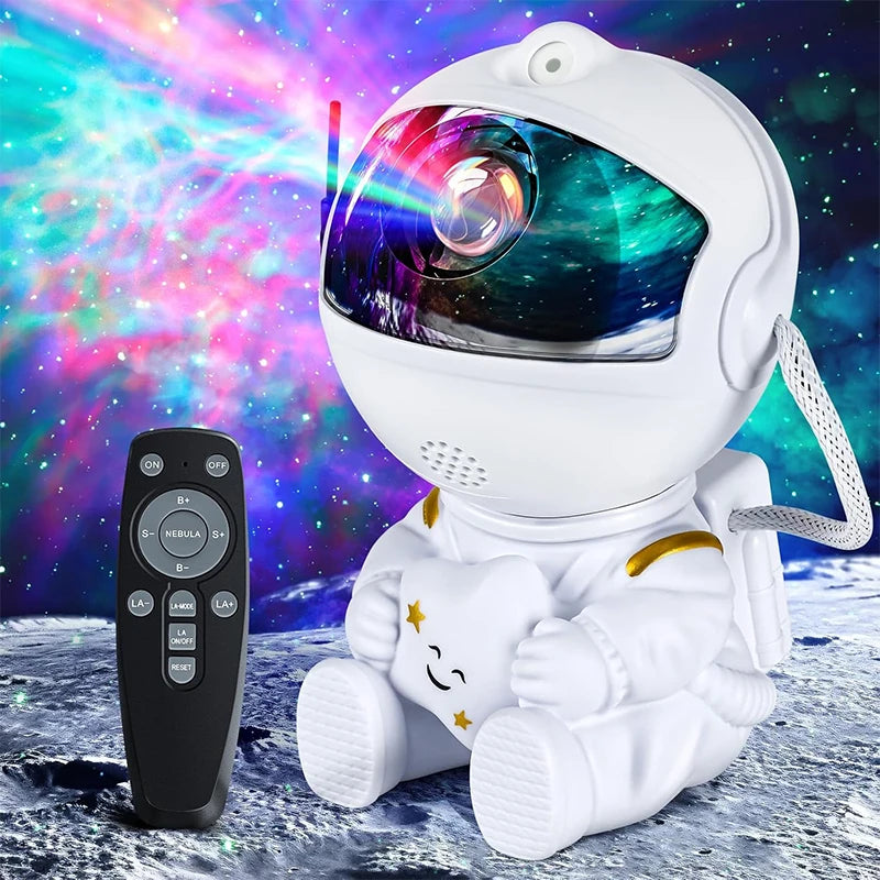 A white astronaut night light projector with a colorful galaxy display and a remote control.
