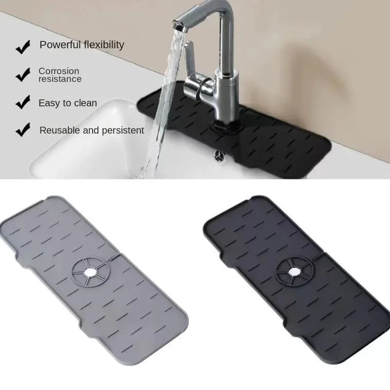 Black silicone kitchen sink drainer and splash guard mat with a flexible faucet