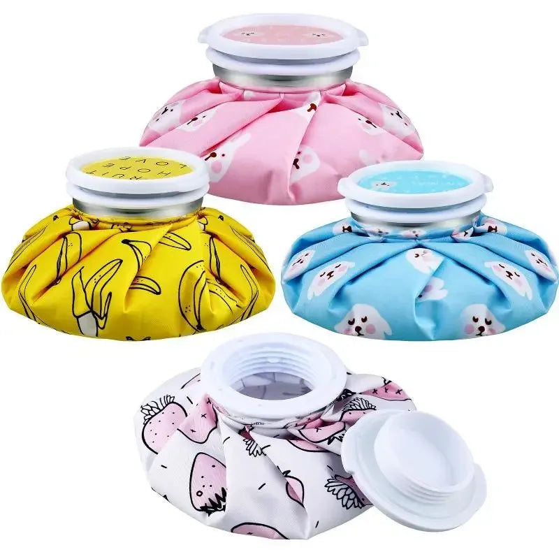 A set of reusable ice and hot water therapy packs in pink and blue patterns.